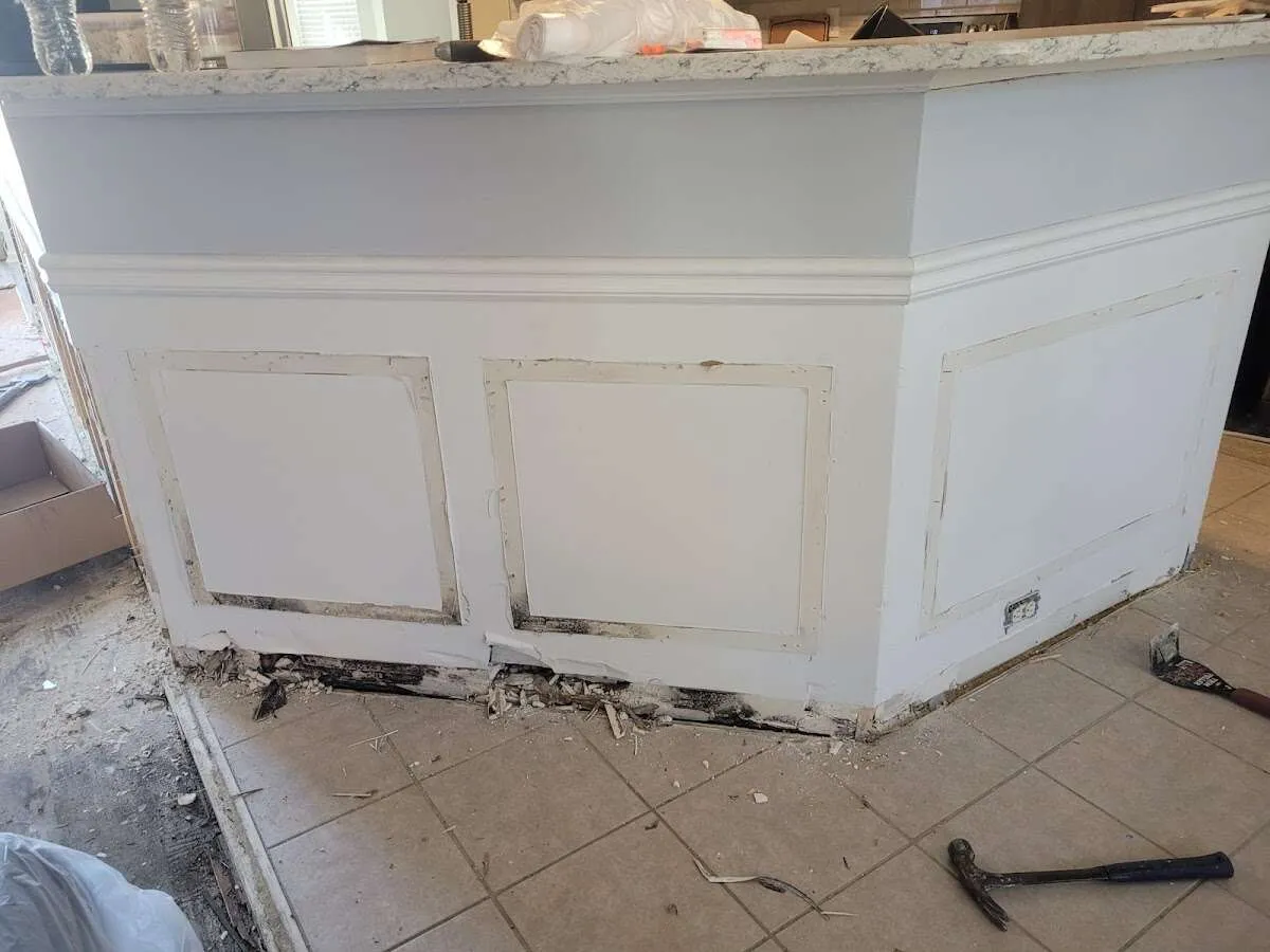 Water damage and mold on kitchen during Storm Damage Restoration in Ocean City